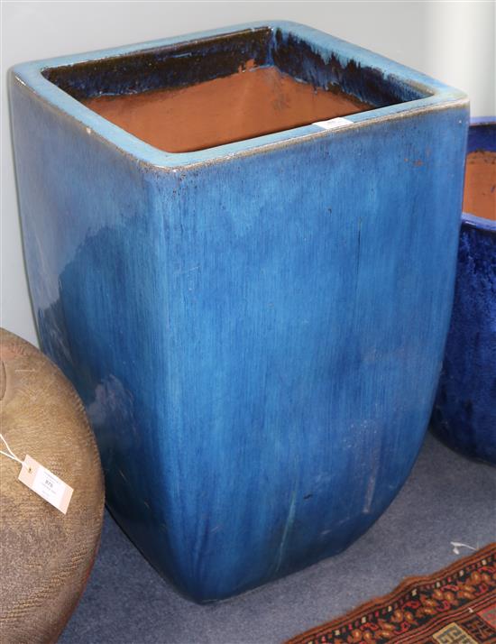 A blue glazed pottery garden urn, Diameter 48cm H.74cm